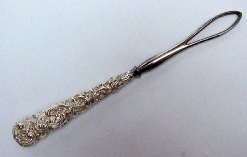 A Victorian Silver Ribbon Threader.