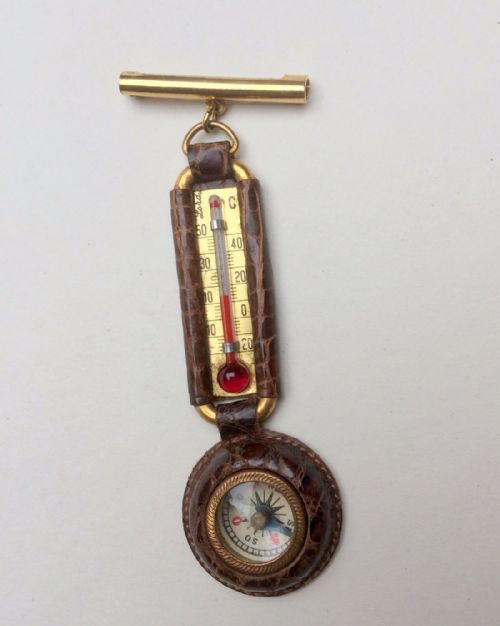 A Vintage Traveler's Compass and Thermometer Fob.