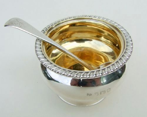 fig 1. A George V silver gilt condiment tub and ladle.