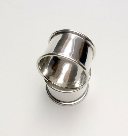 fig 1. A pair of George V silver napkin rings.