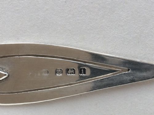 fig 1. A gorgeous silver and mother-of-pearl trowel bookmark.