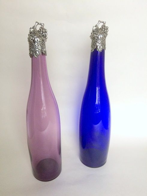 A Fabulous and Extremely Rare Pair of Early Silver Mounted Champagne Decanters.