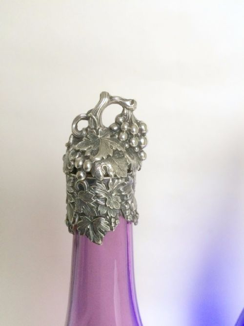 fig 1. A fabulous and extremely rare pair of early silver mounted champagne decanters.