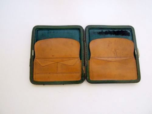 fig 1. A late Victorian silver mounted leather wallet.