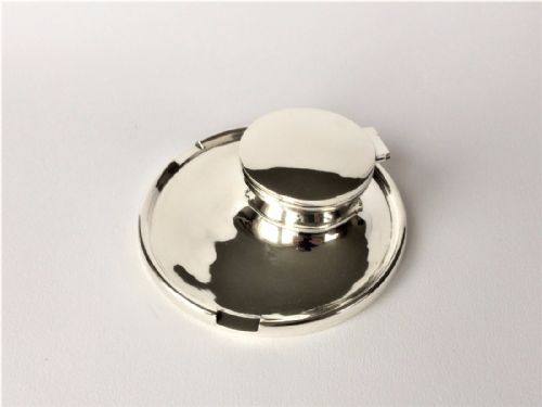 A Smart Capstan Silver Inkwell from the Art Deco Period.