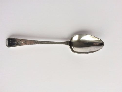 fig 1. A superb George III bright cut silver serving spoon.
