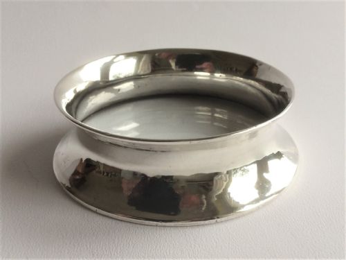 A Desirable Edwardian Silver Wine Bottle Coaster.
