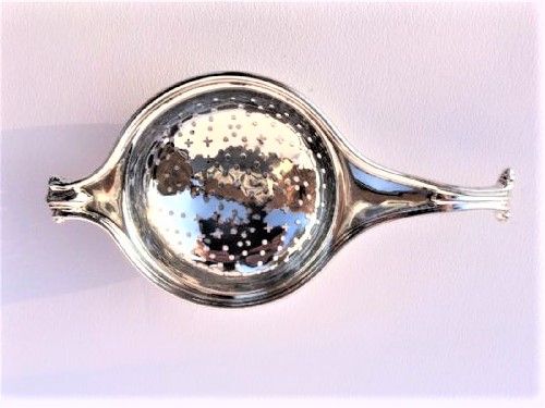 A Rare Onslow Pattern Cast Silver Tea Strainer.