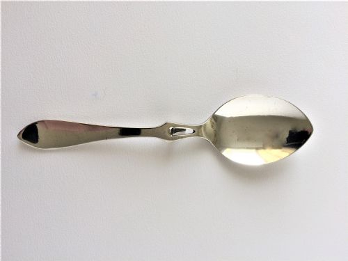 A Desirable Art Deco Silver Honey Spoon.