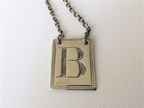 A Georgian Silver 'B' Brandy Decanter Label.