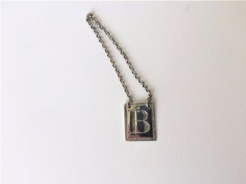 fig 1. A Georgian silver 'B' Brandy decanter label.