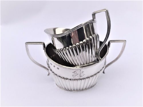 fig 1. A fine Victorian silver cream jug and sugar bowl.