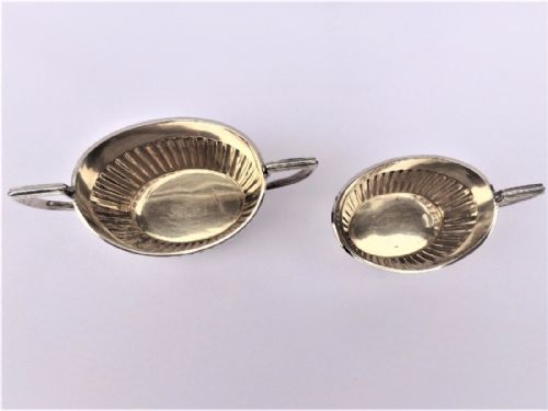 fig 2. A fine Victorian silver cream jug and sugar bowl.