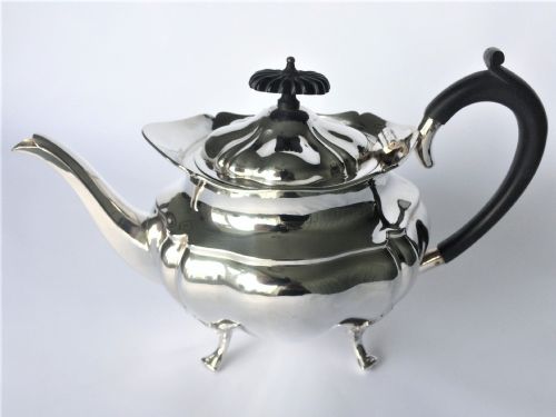 A Handsome Family Size Silver Teapot.