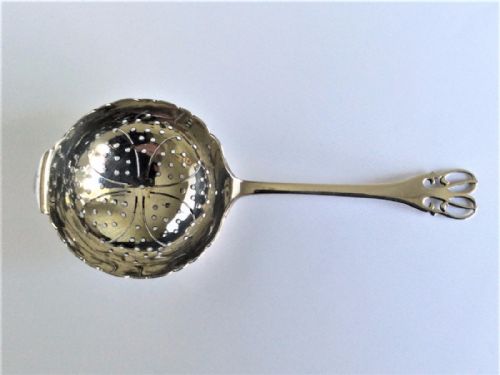 A Delightful Art Nouveau Silver Tea Strainer