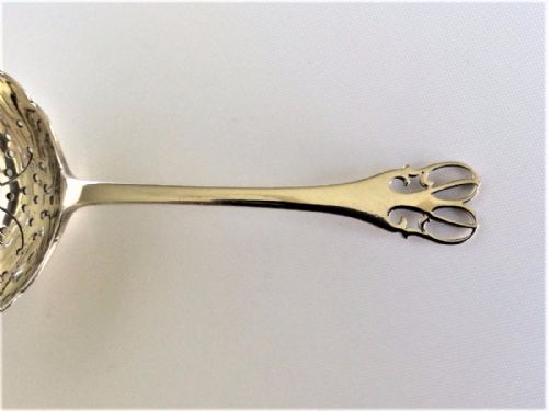 fig 1. A delightful Art Nouveau silver tea strainer
