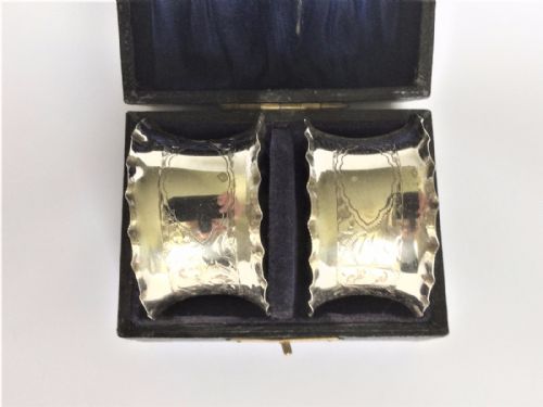 A Pair of Edwardian Chester Silver Napkin Rings.