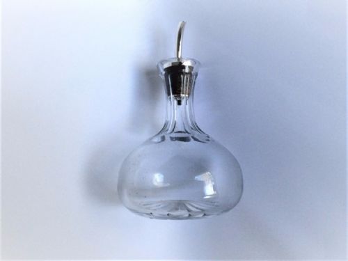 fig 1. A lovely silver mounted angostura bitters jigger.