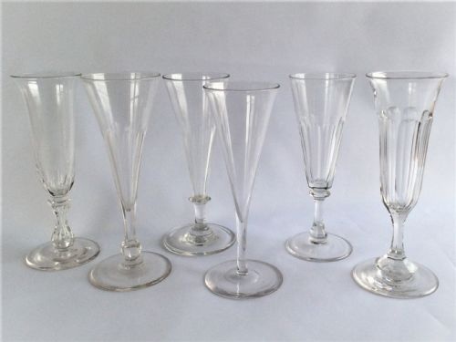 A Victorian Harlequin Set of Six Cut Champagne Flutes.