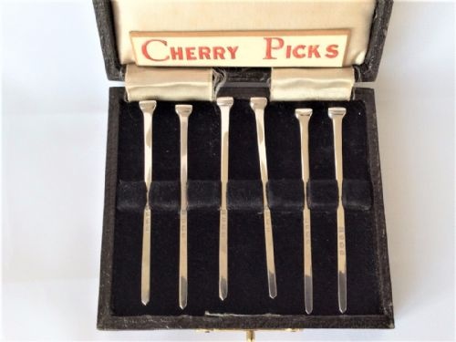 fig 1. A lovely set of novelty silver 'hob nail' cocktail sticks.