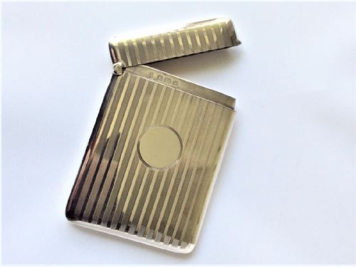 fig 1. A stylish engine turned silver card case.
