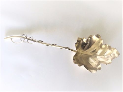 A Sterling Silver Naturalistic Fruit or Dessert Serving Spoon.