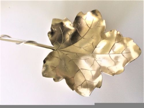 fig 1. A Sterling silver naturalistic fruit or dessert serving spoon.
