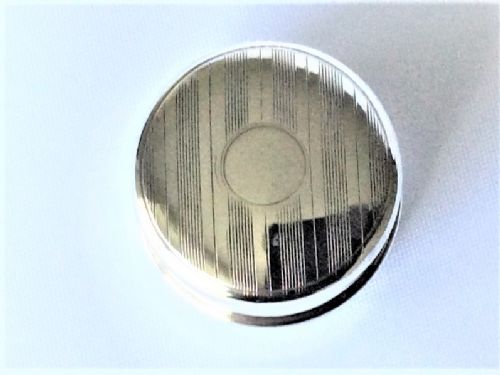 fig 1. A stylish engine turned silver ring box.