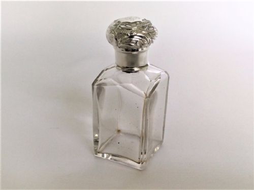 A Charming Silver Mounted Cologne Bottle & Sprinkler.