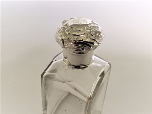 fig 1. A charming silver mounted cologne bottle & sprinkler.