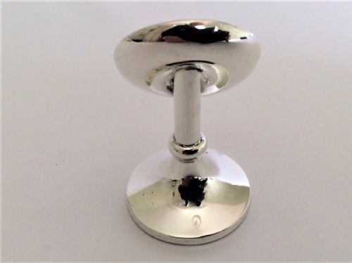 fig 1. An unusual silver fob watch stand.