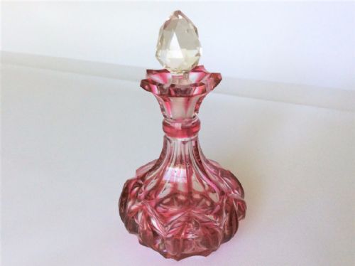 A Charming Victorian Gothic Cranberry Scent Bottle.