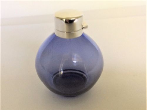fig 1.  A stunning silver mounted Asprey's cologne bottle.