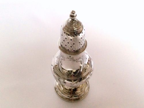 fig 1. A rare 18th Century silver caster.
