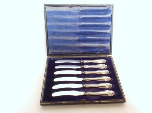 A Lovely Set of Six Silver Handled Butter Knives.