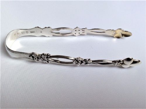A Lovely Pair of Pierced Victorian Silver Tongs.