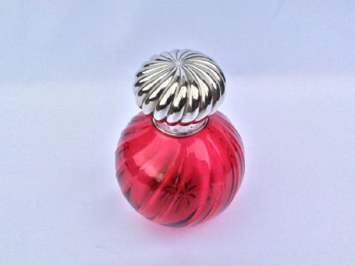 fig 1. A fabulous Victorian silver mounted cranberry cologne bottle.