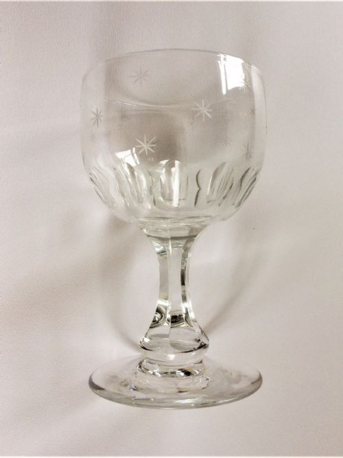 A Late Victorian Star Etched Wine Goblet.