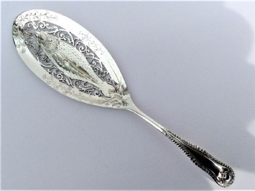 A Gorgeous Pierced Silver Sardine Serving Slice.