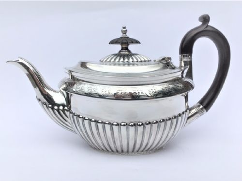 A Superb Victorian Silver Breakfast Teapot.