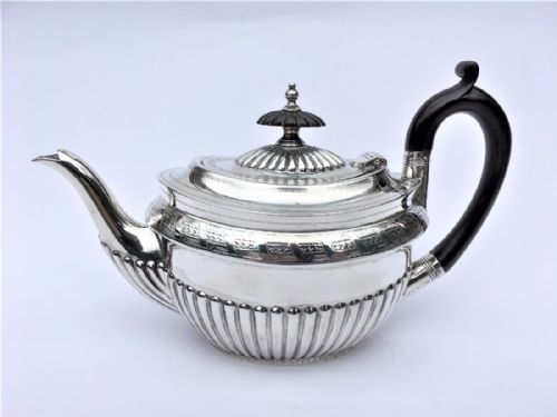 fig 1. A superb Victorian silver breakfast teapot.