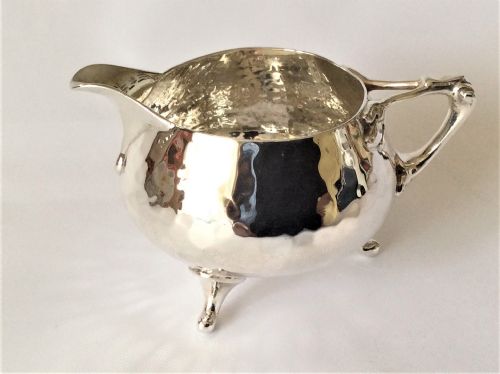 A Superb Arts & Crafts Small Silver Cream Jug.