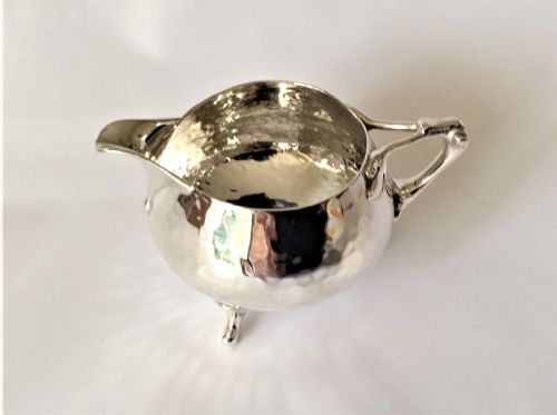 fig 1. A superb Arts & Crafts small silver cream jug.