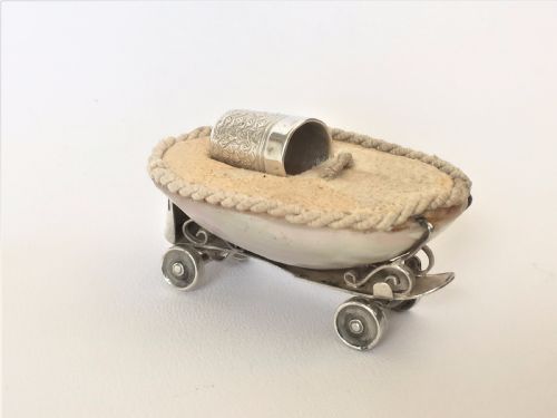 A Rare Edwardian Novelty Silver Roller Skate Thimble Holder.