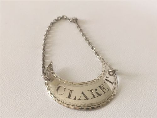 fig 1. An 18th Century Sheffield silver Claret Label.