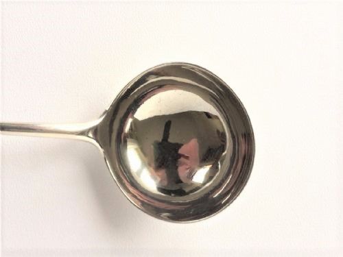 fig 1. A Georgian Newcastle silver gravy ladle.