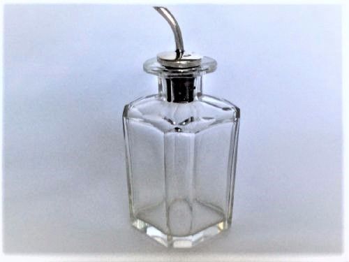 A Handsome Angostura Silver Mounted Jiggers Bottle.