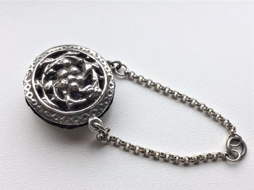 An Edwardian Silver 'Wheel' Pincushion.