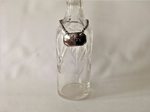 fig 1. A rare Edwardian soy bottle with hallmarked silver label.