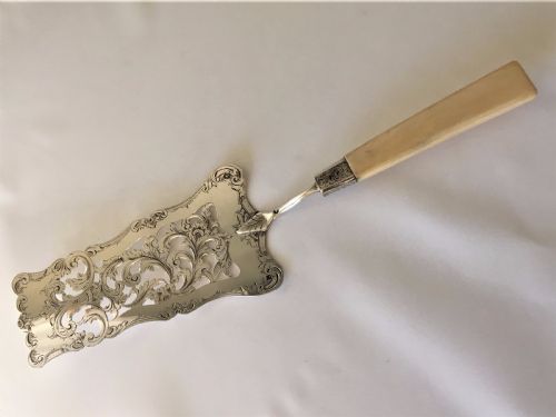 A Fabulous Dutch Silver Pierced Serving Slice.